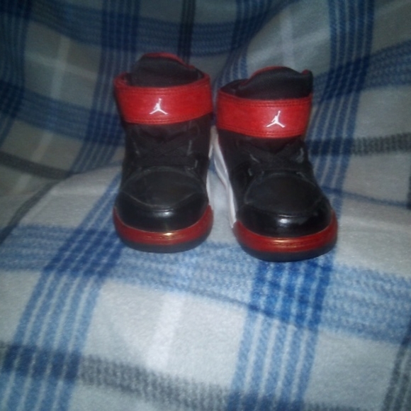 black and red baby jordans
